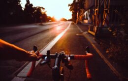 person riding on bicycle on road